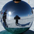 a bottle of Syrah atop an orb outside the McMurdo Station in Antarctica